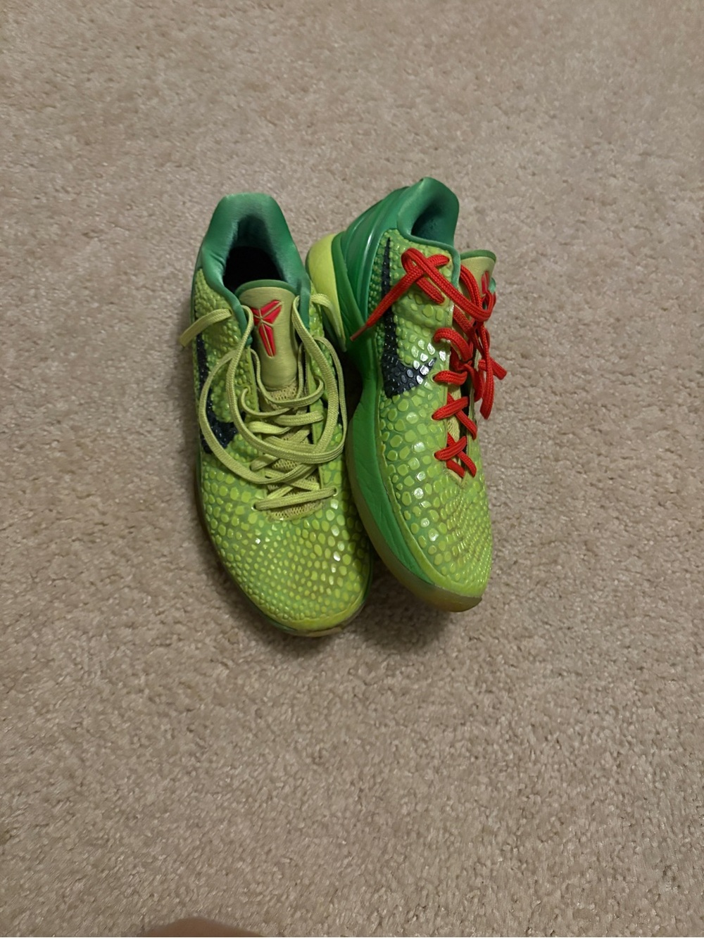 Nike Kids Low-Top Athletic Shoes in Neon Green with Red Laces
